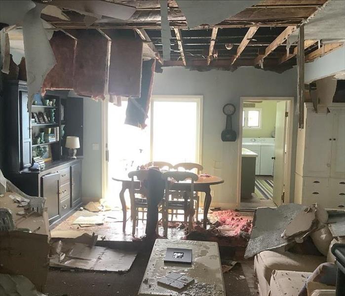 Extremely water damaged living room