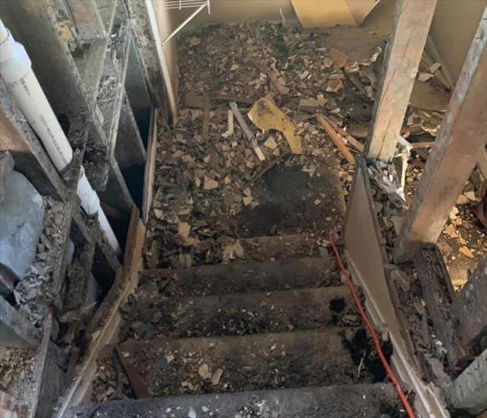 fire, mold, and water damaged stairway