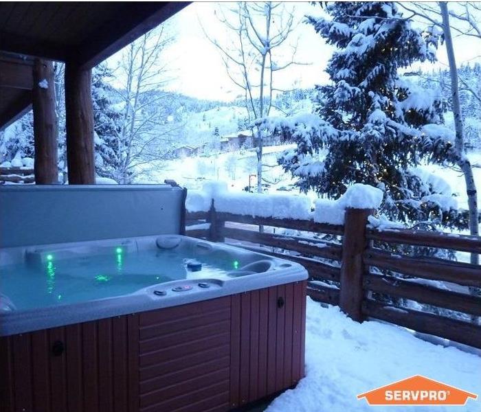 Outdoor hot tub in winter